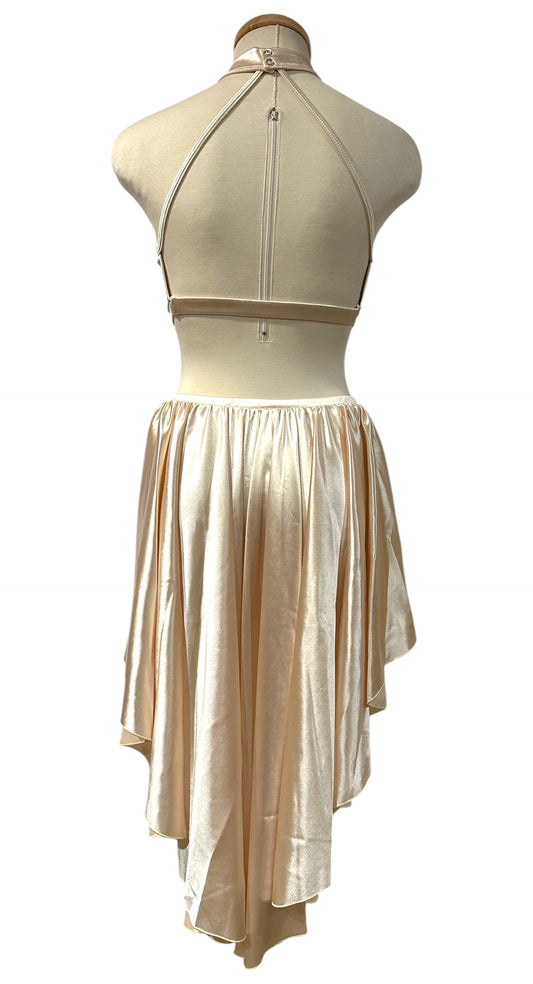 Back view of The Aubrey Base showing the open-back halter design and flowing layered satin asymmetrical skirt.