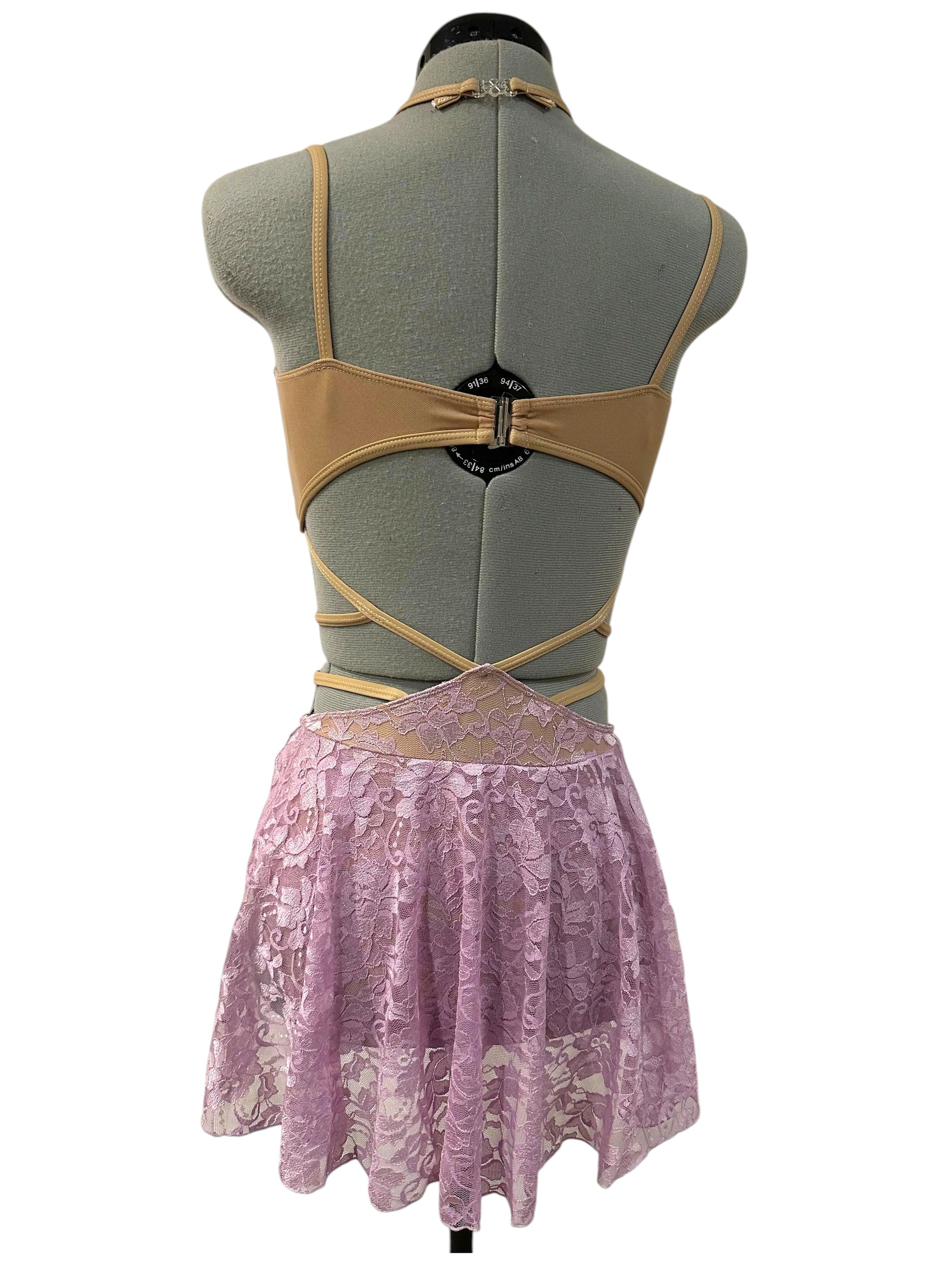 Back view of Ava dance costume base in lavender with open-back design and lace competition styling