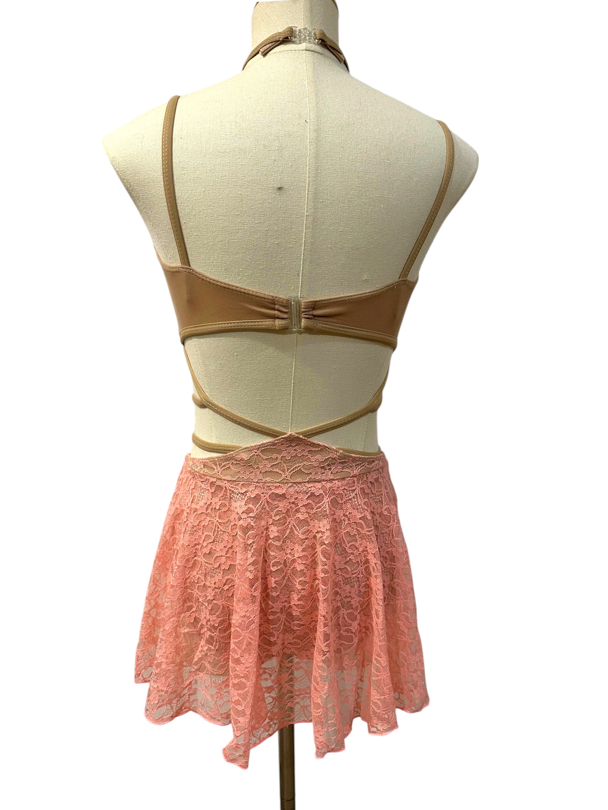 Back view of Ava dance costume base in pink with open-back design and lace competition styling