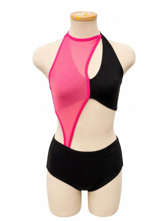 Vita Base dance costume in hot pink and black featuring dramatic asymmetrical color blocking, high neckline, and contemporary cutout design front view