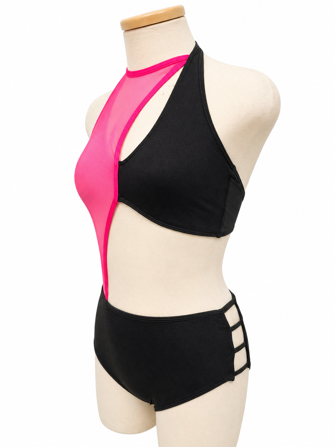 Vita Base dance costume side profile featuring asymmetrical styling, cutout design, and competition-ready silhouette
