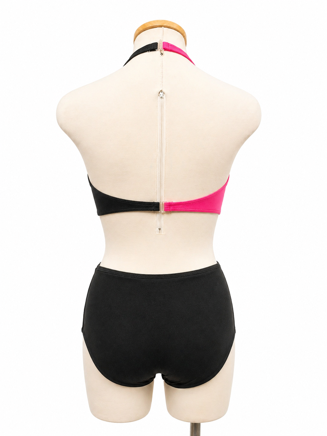 Vita Base competition dance costume back view featuring open-back styling and asymmetrical performance design