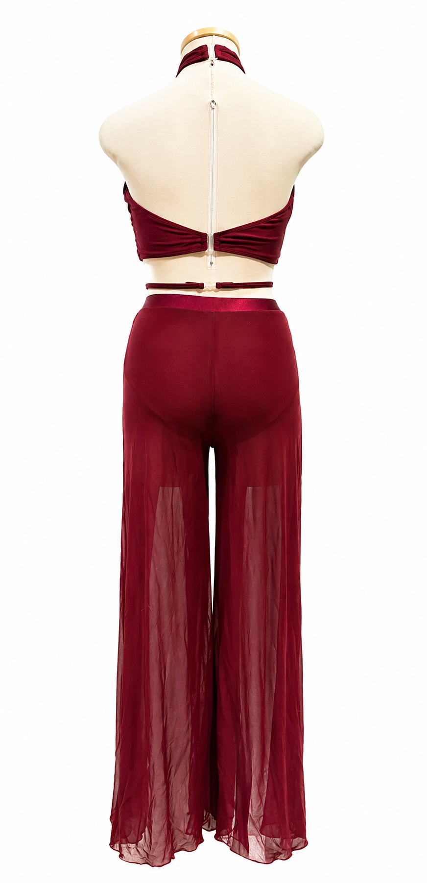 Back view of Abbey Base dance costume with strappy open-back design and flowing skirt panels