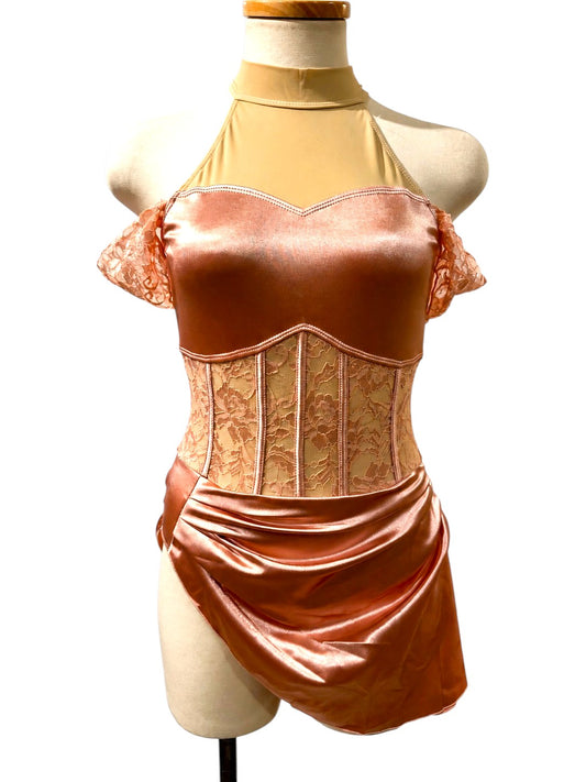 Gwendolyn Signature dance costume base in Powder Rose satin and lace, front view with draped asymmetrical skirt and off-shoulder lace accents.