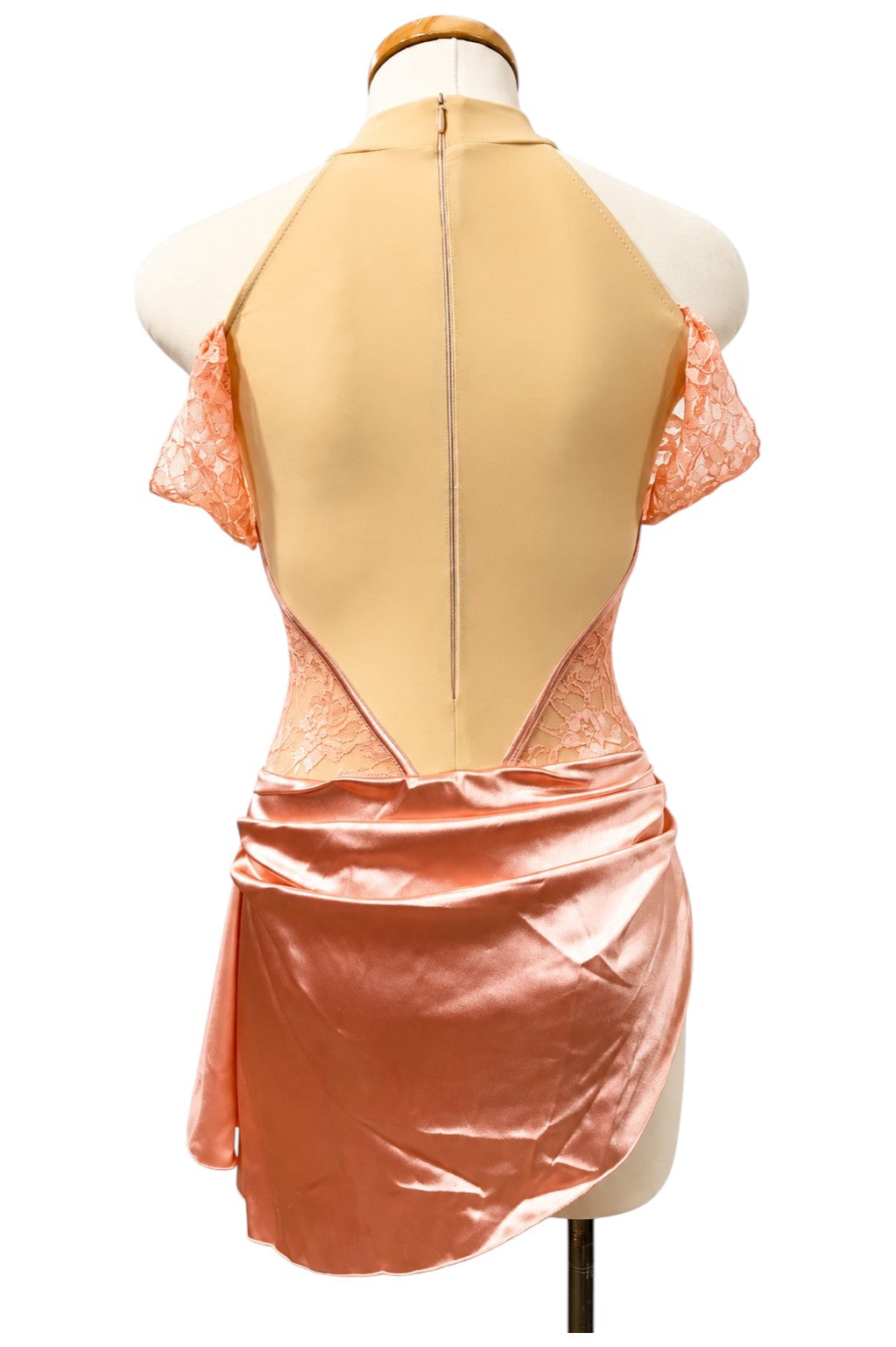 Gwendolyn Signature dance costume base in Powder Rose, back view showing high neckline, open back, lace side panels, and draped satin skirt.