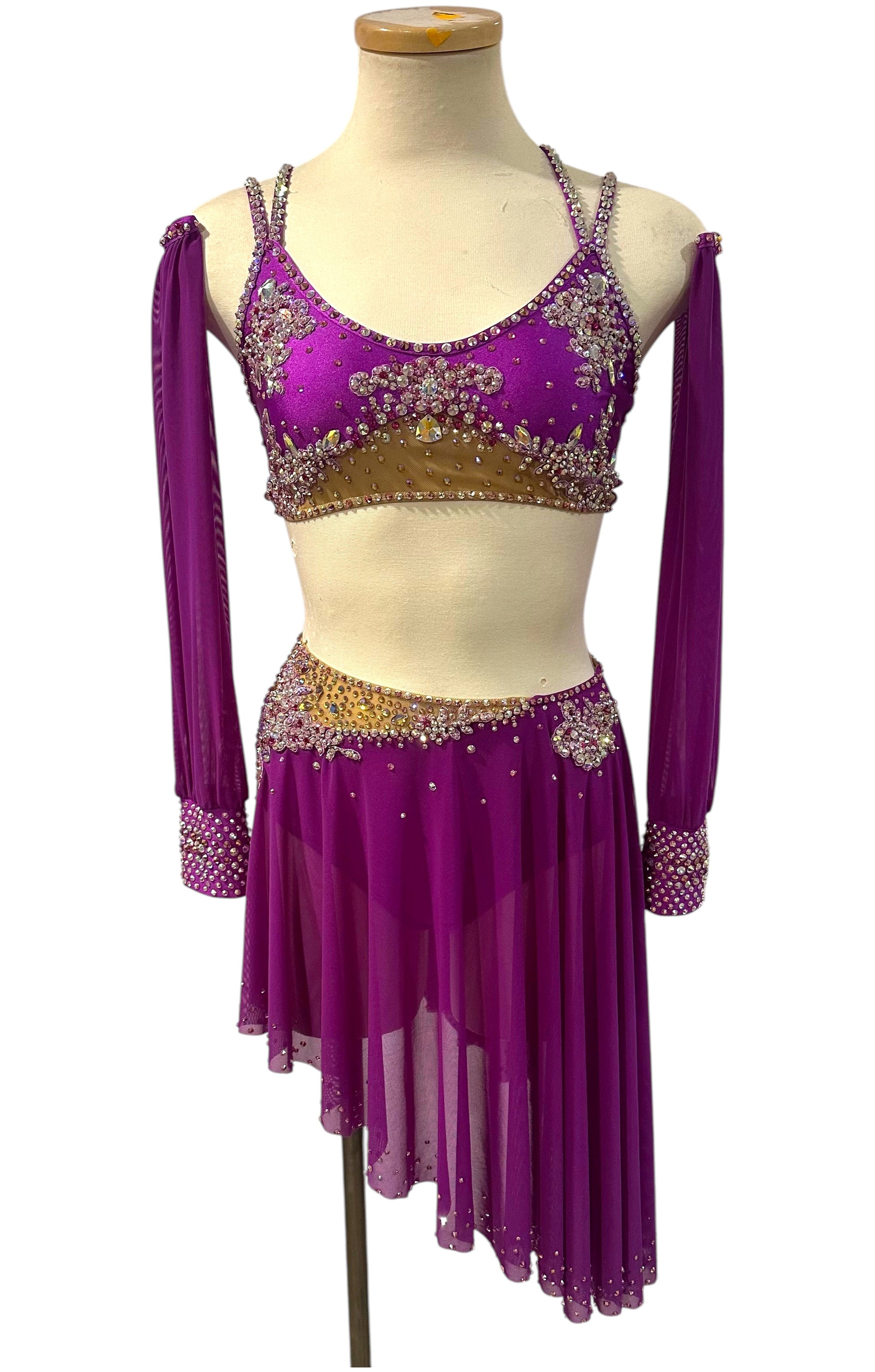 Fuchsia rhinestone two-piece dance costume with asymmetrical mesh skirt front view.