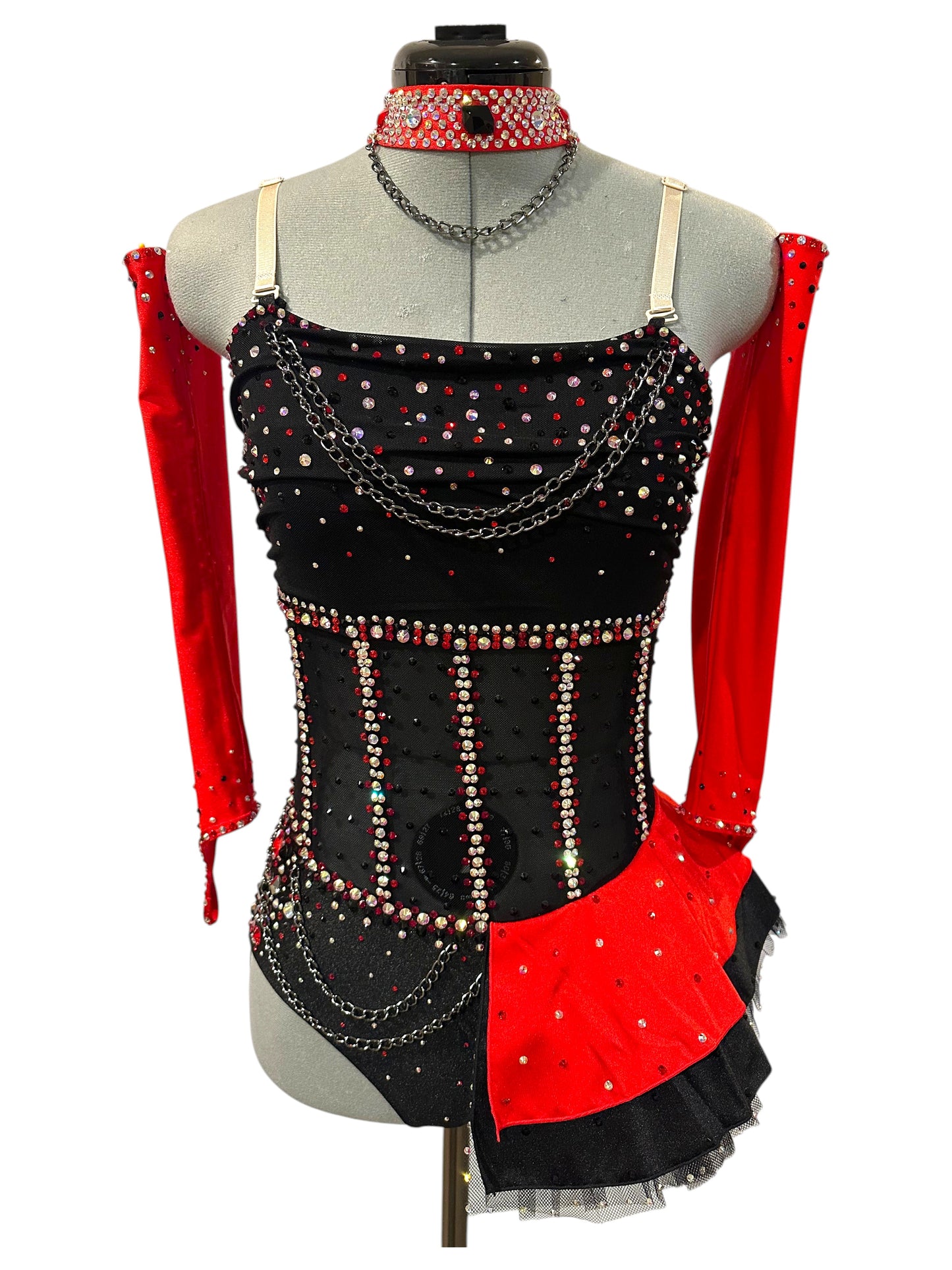 Black and red rhinestone dance costume featuring an illusion mesh corset bodice, chain accents, detachable sleeves, rhinestone choker, and red satin peplum.