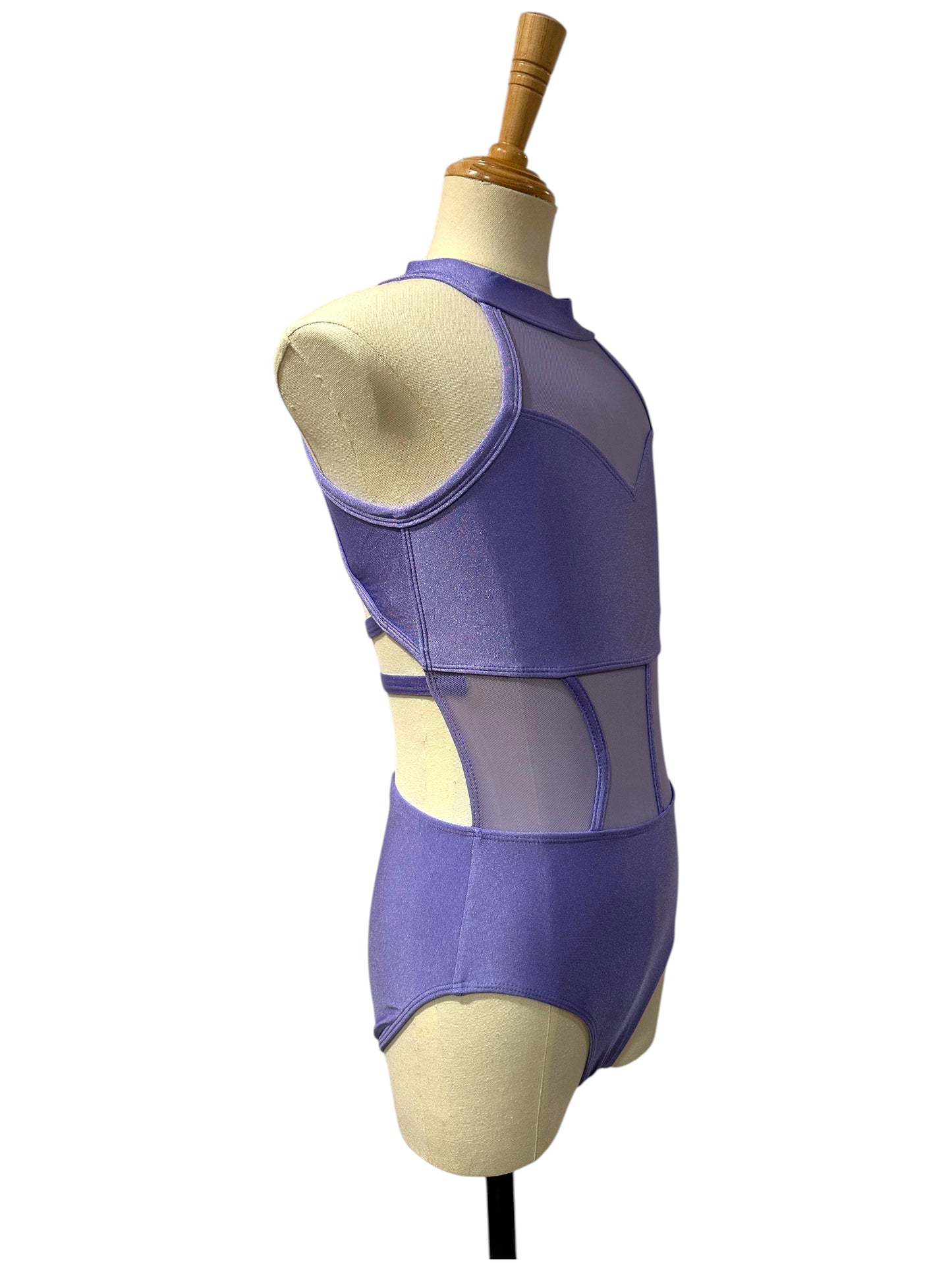 Right side view of the purple Shanna Base Studio Collection dance costume base highlighting illusion mesh side panels and a streamlined silhouette.