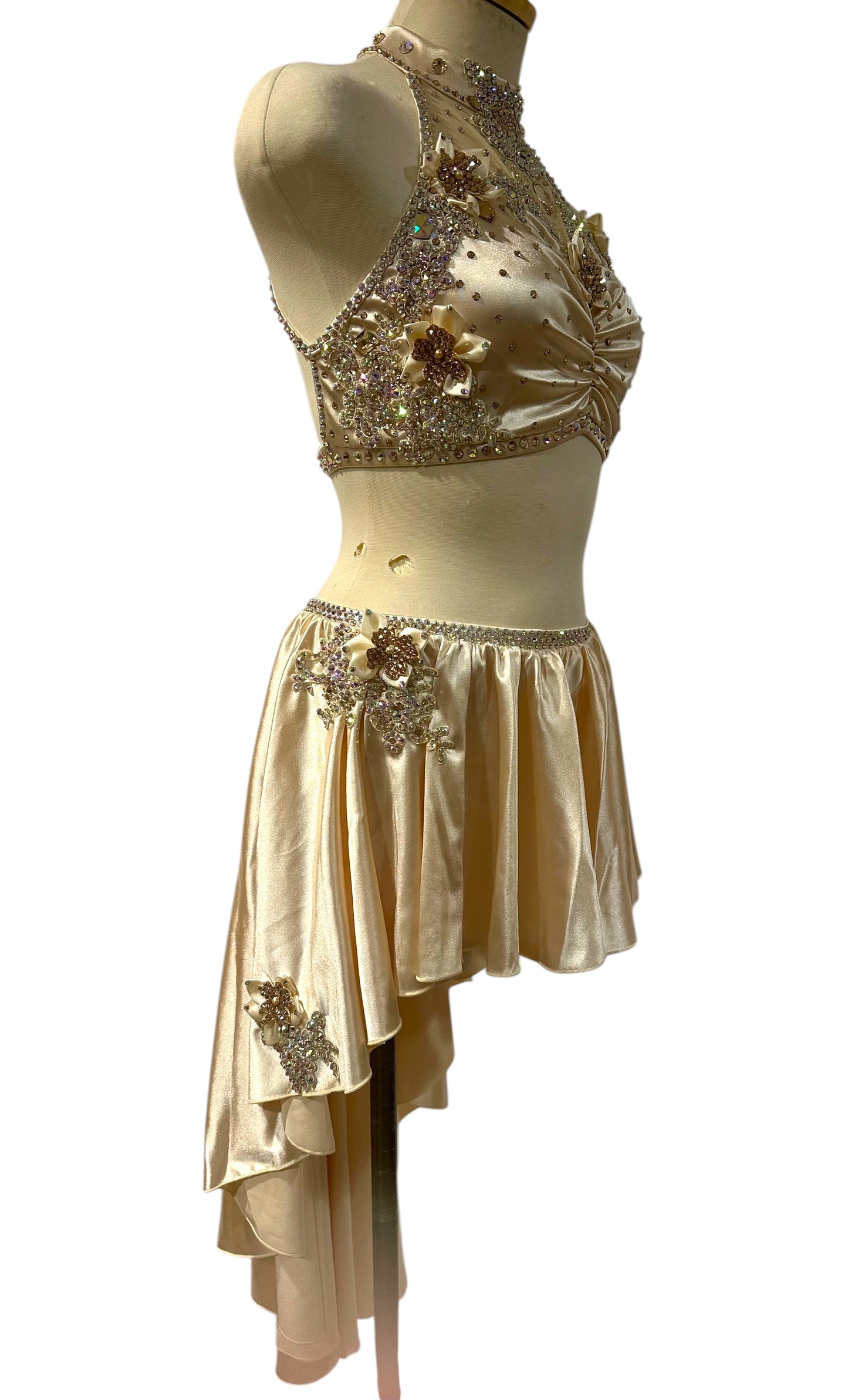 Right side view of the Aubrey Ready-to-Ship dance costume featuring elegant draping, floral crystal embellishments, and a layered asymmetrical skirt.