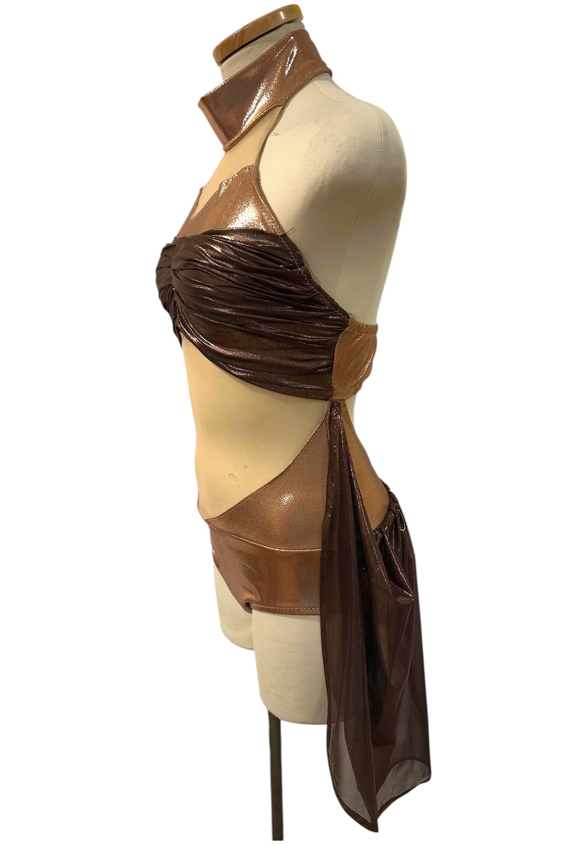 Left side view of the Aurora Signature Base showing ruched metallic bodice and asymmetrical mesh drape.