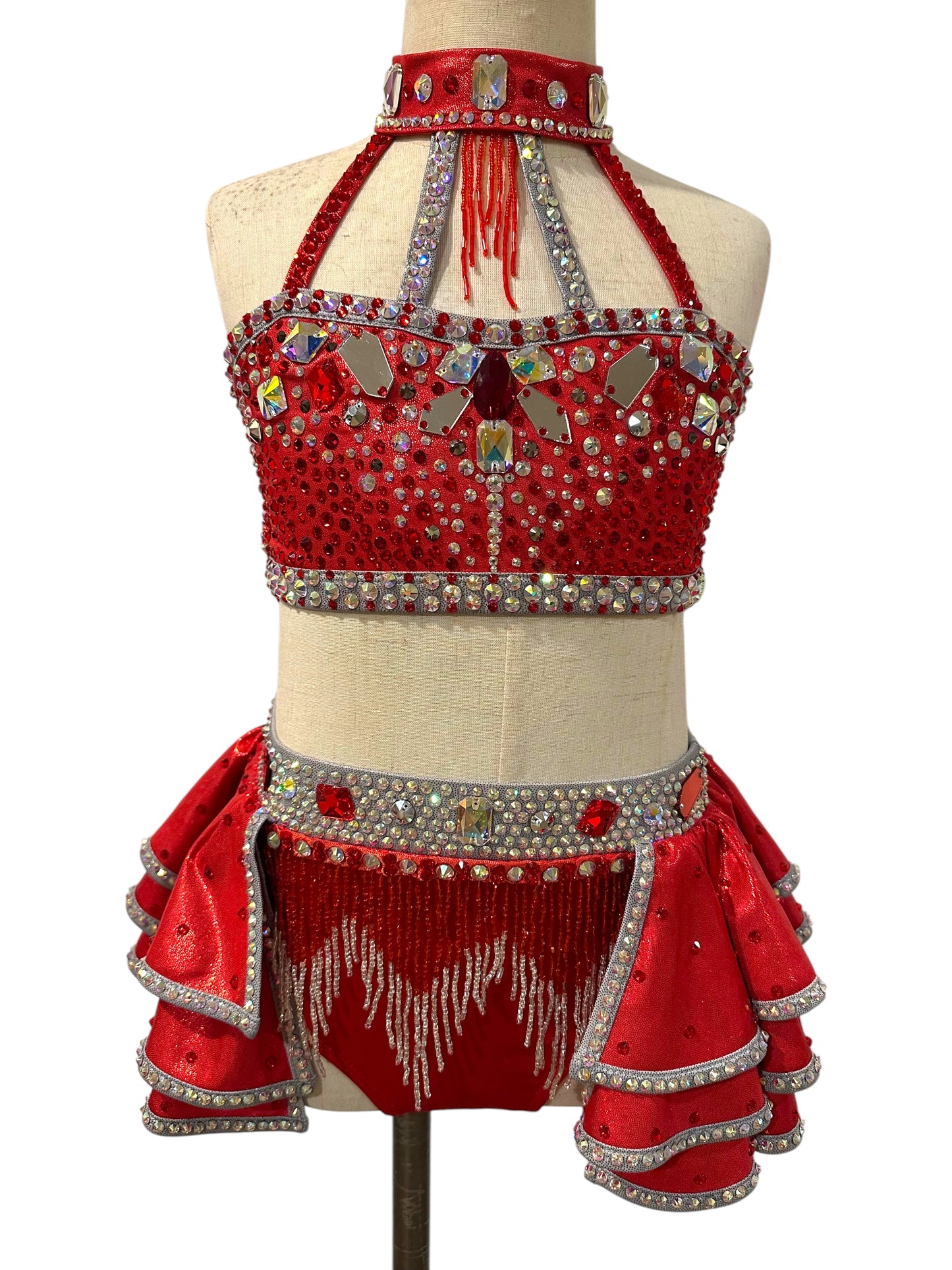 Front view of Elite Designs by Dawn Kiki Ready-to-Ship dance costume in red metallic fabric with silver crystal embellishments, layered ruffles, and detachable arm sleeves.