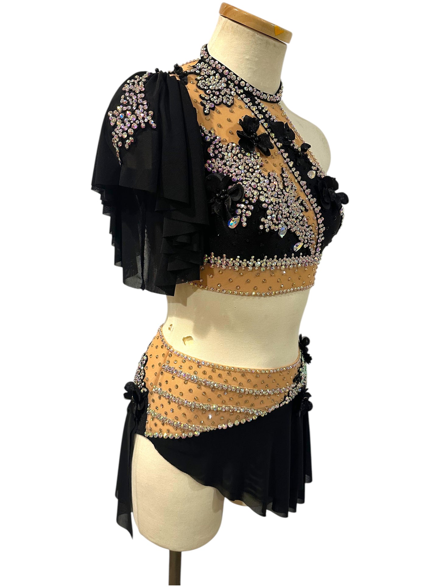 Side view of Scarlett Ready-to-Ship dance costume with nude illusion mesh, crystal embellishments, and black mesh skirt.