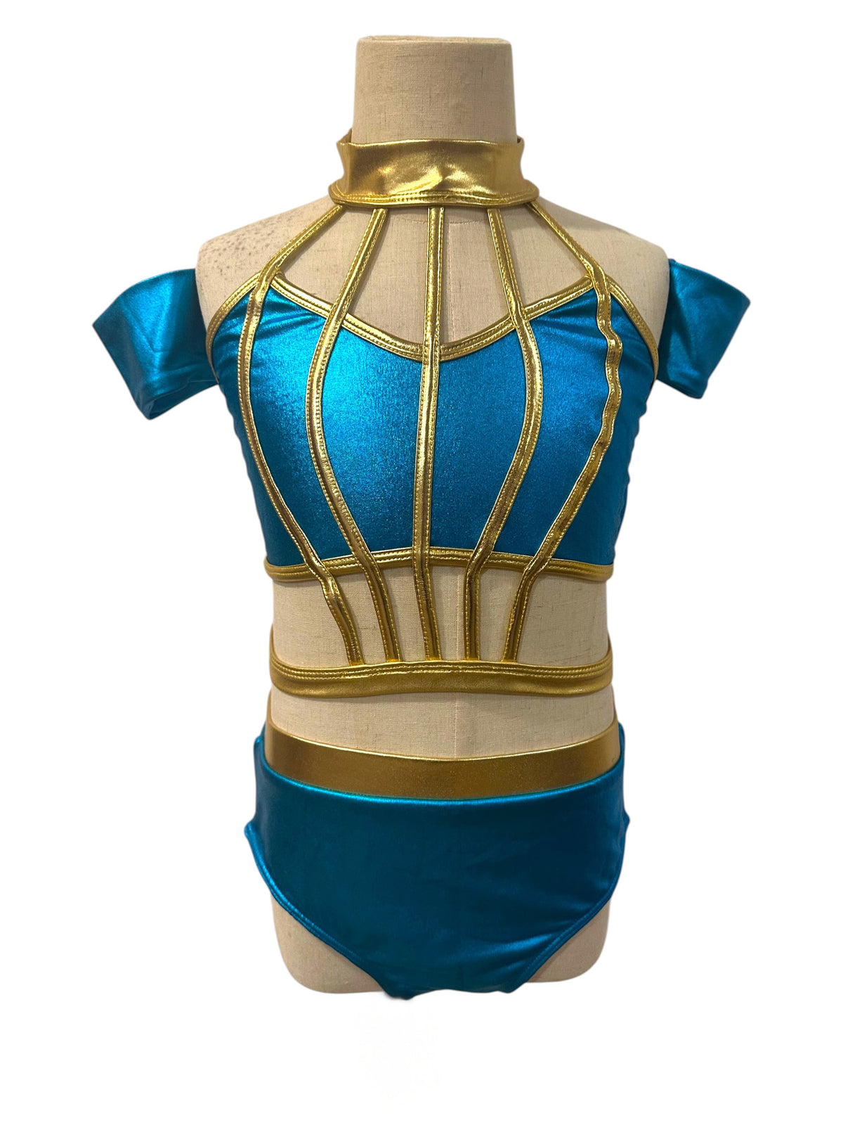 Savy two-color metallic dance costume base in River Blue and Light Gold with nude illusion detailing and matching arm cuffs