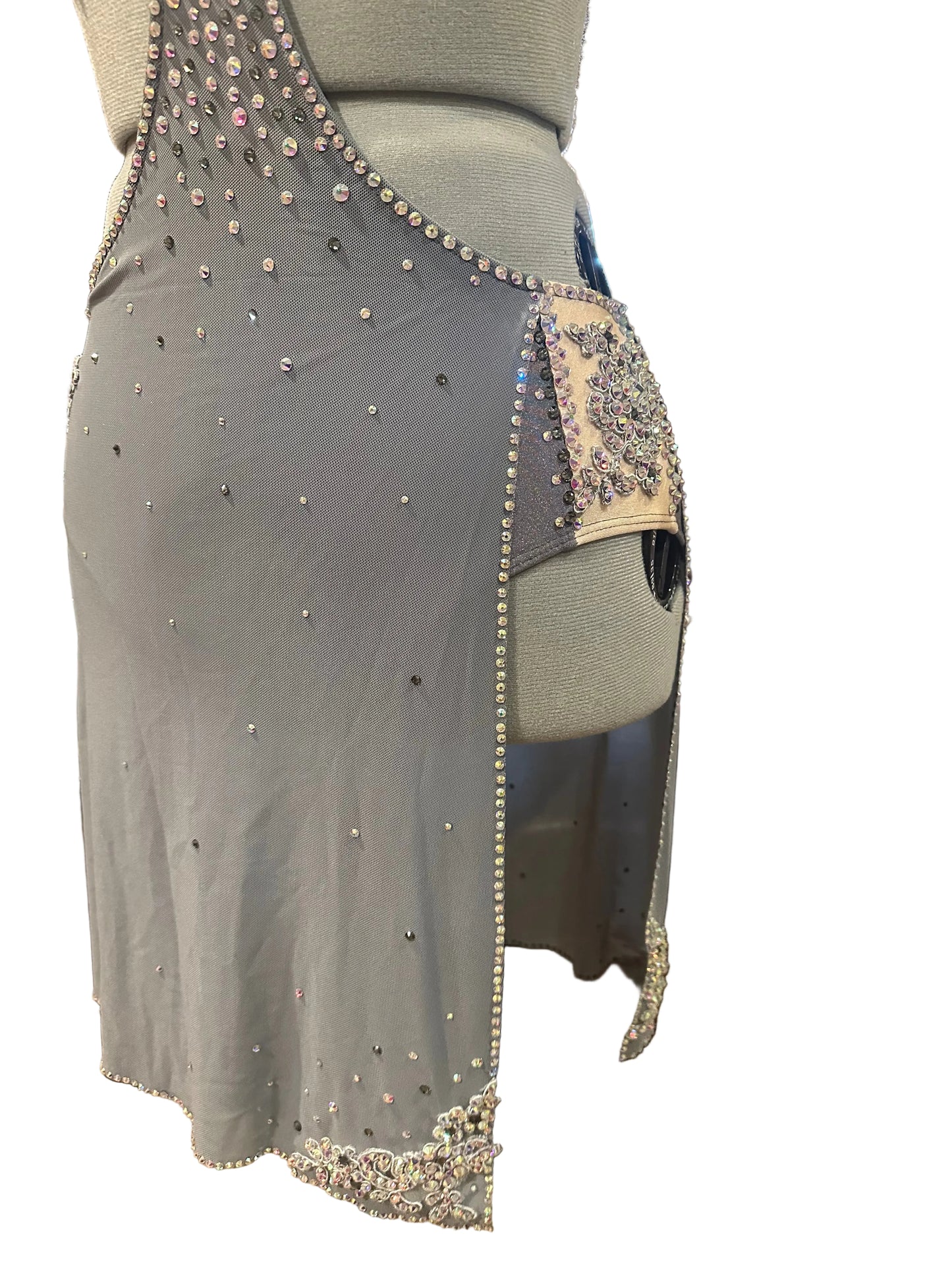 Gray dress with rhinestone embellishments on a mannequin