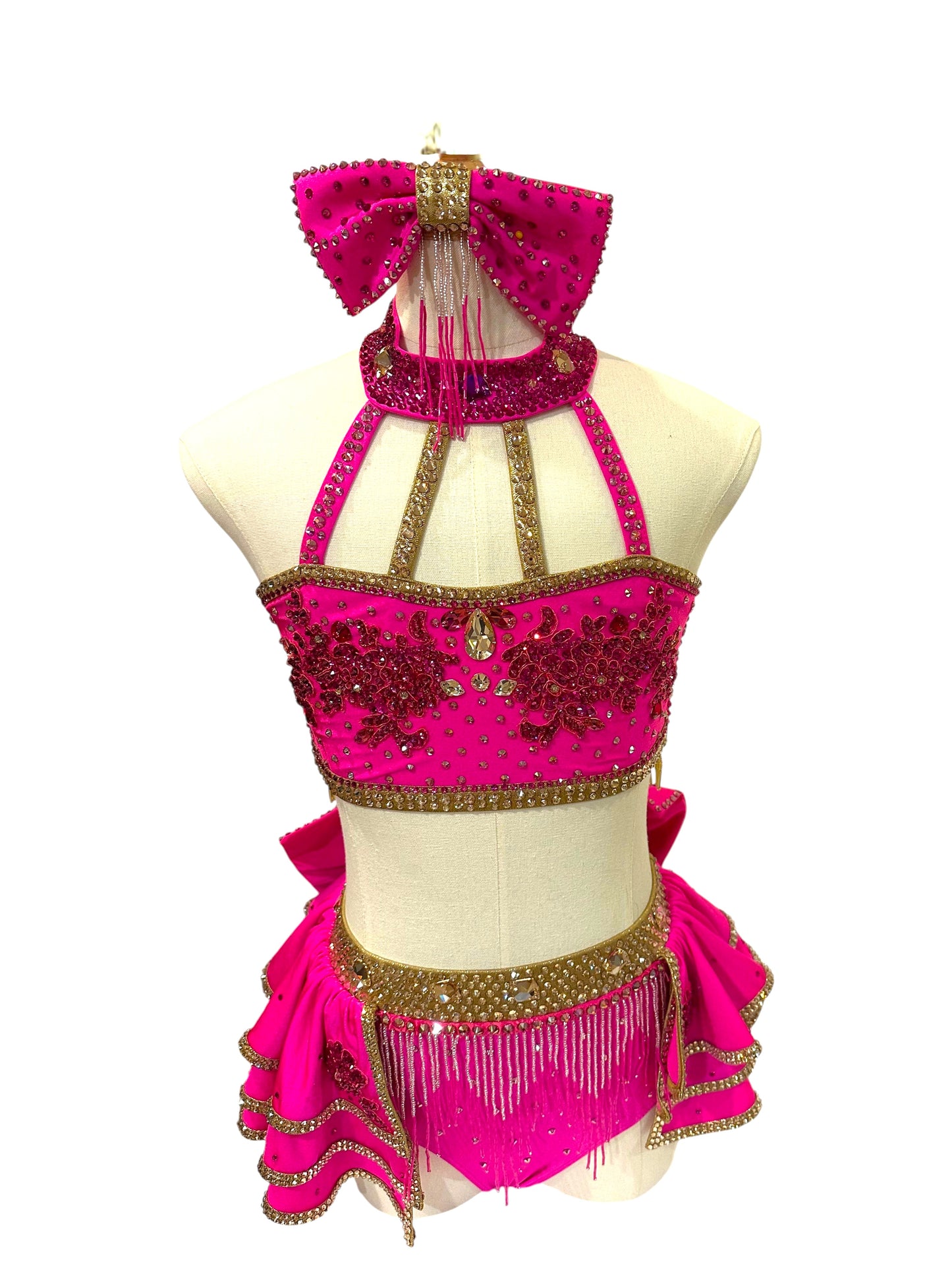 Front view of ready-to-ship hot pink and gold competition dance costume featuring two-piece styling and premium rhinestone detailing.