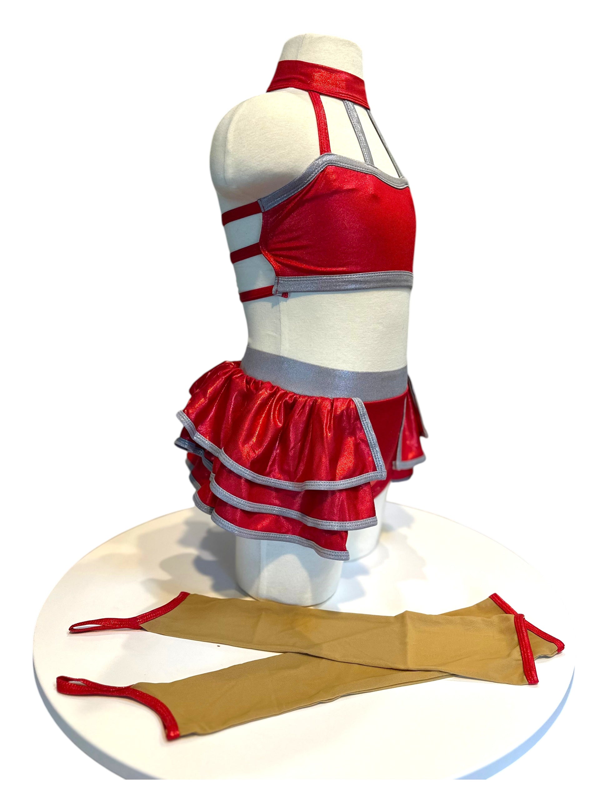 Side profile of KiKi Base dance costume with layered hologram skirt