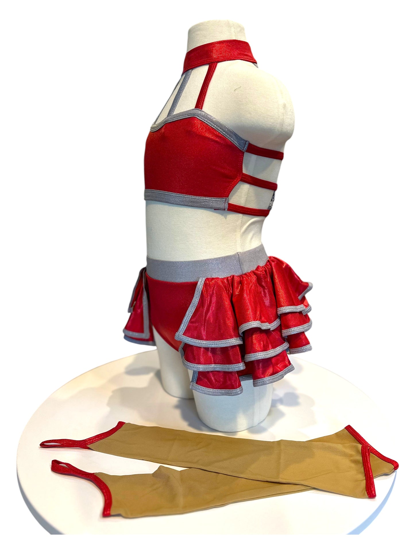 Side profile of KiKi Base dance costume with layered hologram skirt