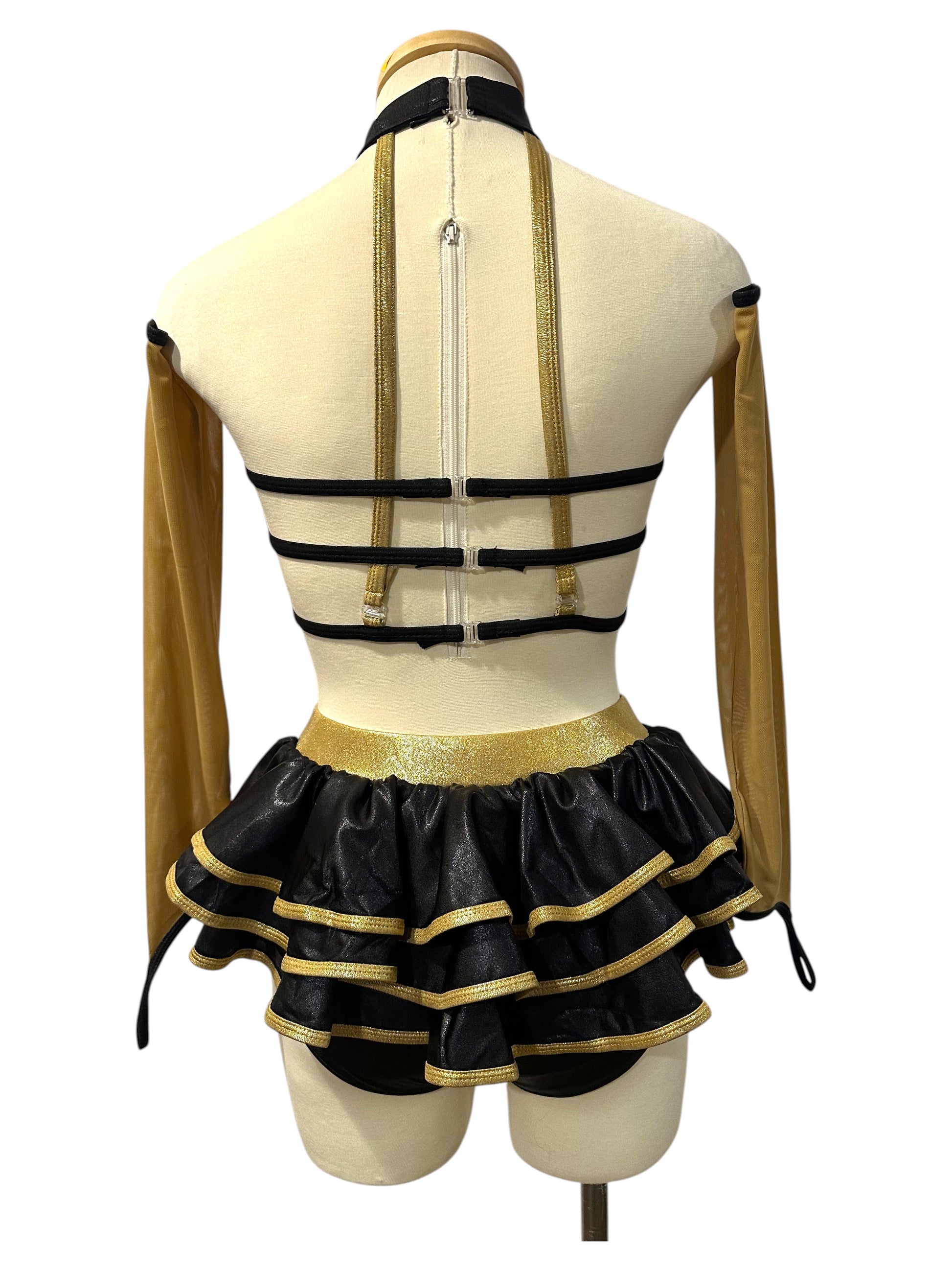 Back view of KiKi Base hologram dance costume in black and gold colorway