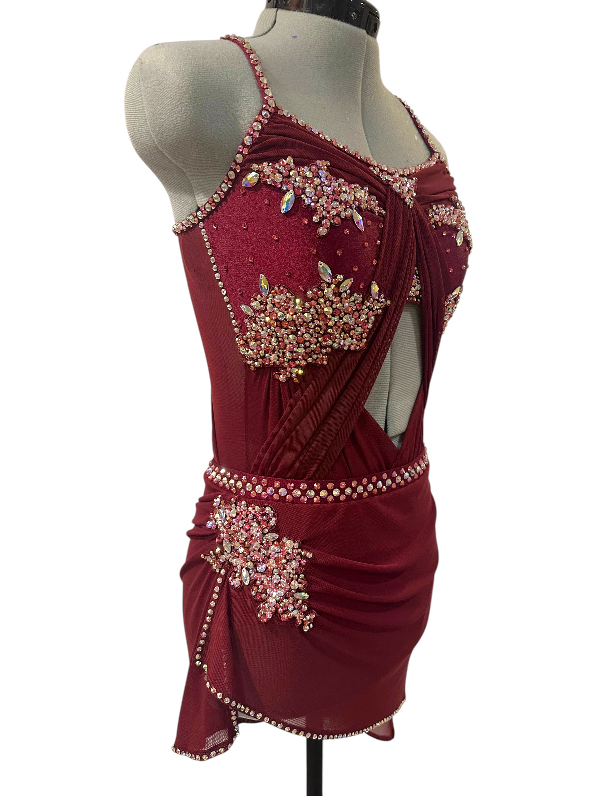 Burgundy lyrical dance costume with front cutout design, AB rhinestones, and elegant draped detailing for competition performance