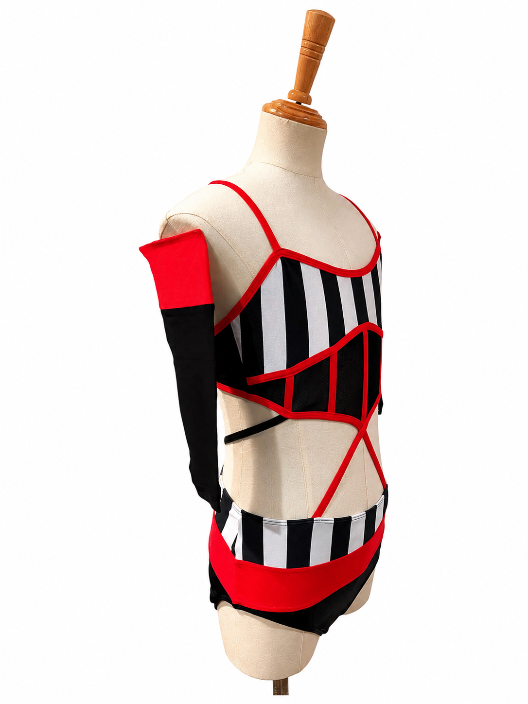 Right side profile of the Kat Base dance costume featuring dramatic cutouts, red trim, and breathable illusion mesh construction.