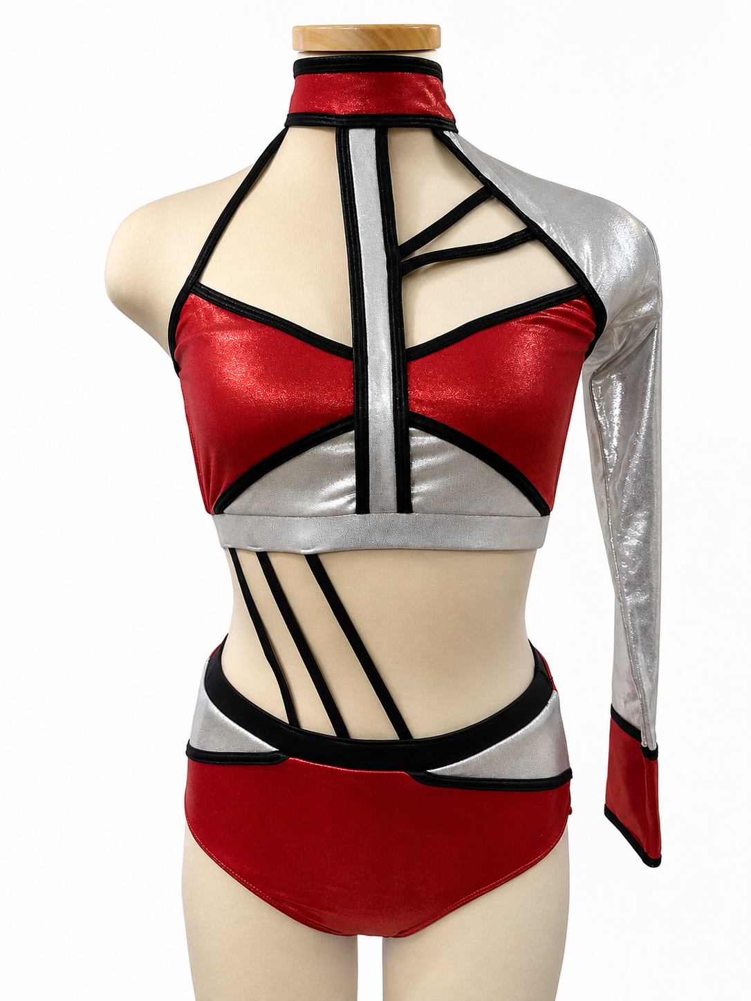 Lauri Base dance costume in Metallic Red, Black, and Silver with asymmetrical top, single long sleeve, geometric trim, and high-waisted briefs.