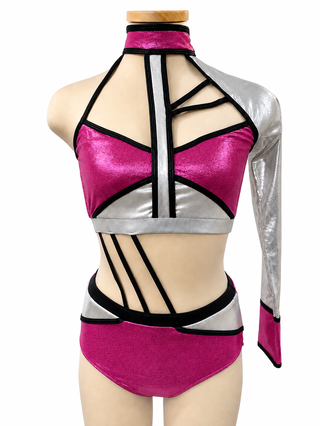 Lauri Base dance costume in Metallic Deep Pink, Black, and Silver with asymmetrical top, single silver sleeve, geometric trim, and high-waisted briefs.