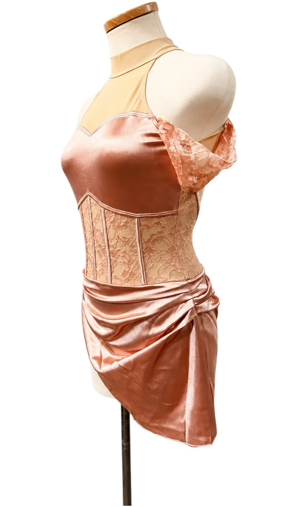 Gwendolyn Signature dance costume base in Powder Rose, angled side view highlighting satin bodice, lace corset-style waist, and asymmetrical skirt.