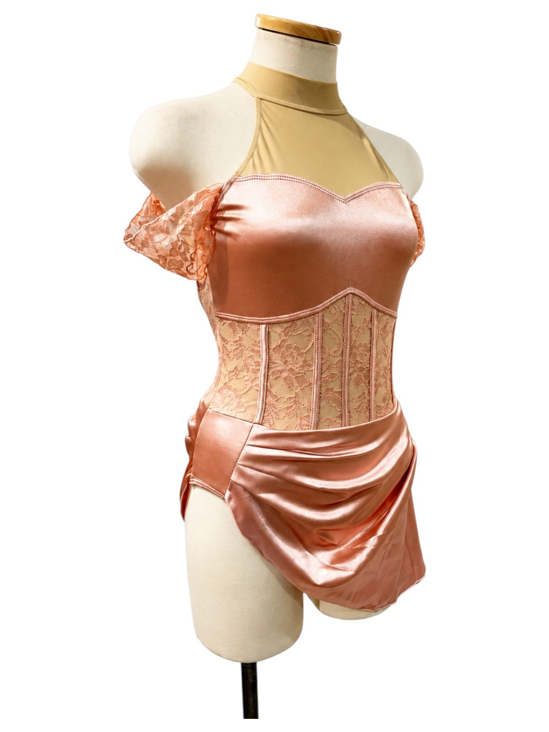 Gwendolyn Signature dance costume base in Powder Rose, opposite angled view showing off-shoulder lace detail, fitted waist, and draped satin skirt.
