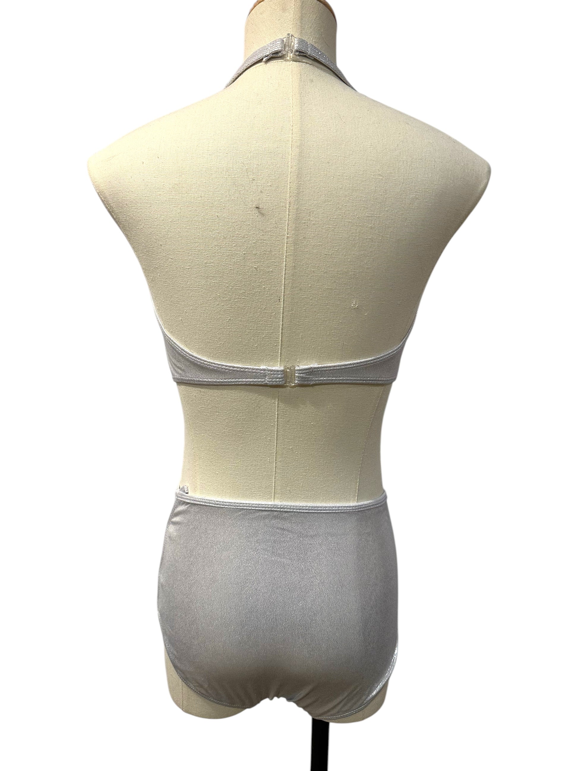 Vita Base in black & grey dance costume back view featuring open-back styling and asymmetrical performance design